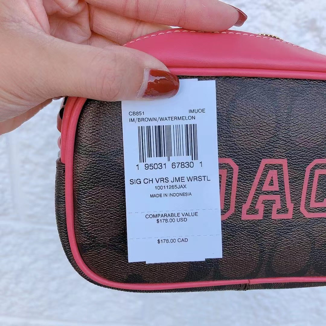 Coach CB851 Jamie Wristlet In Signature Canvas In IM/Brown/Watermelon Coach CB851 Jamie Wristlet In Signature Canvas In IM/Brown/Watermelon